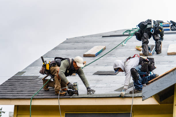 Professional Gutter Installation technician working in East Fairfield, VT